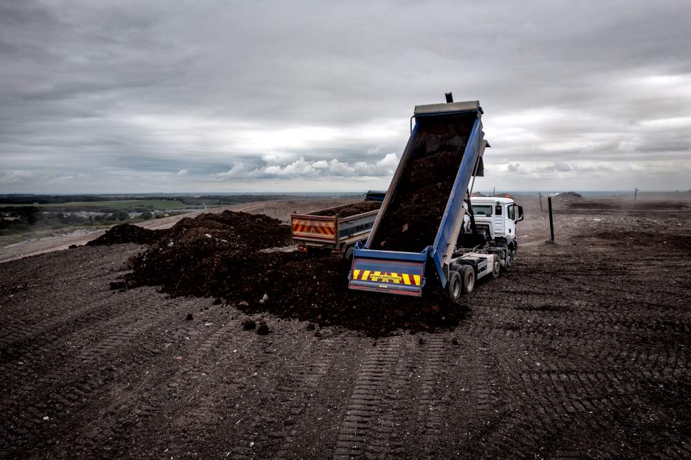 aerial view of tipper truck with raised trailer