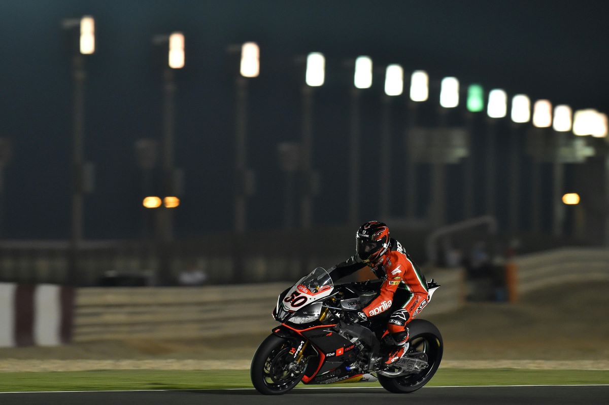 a racer riding super bikes on the track