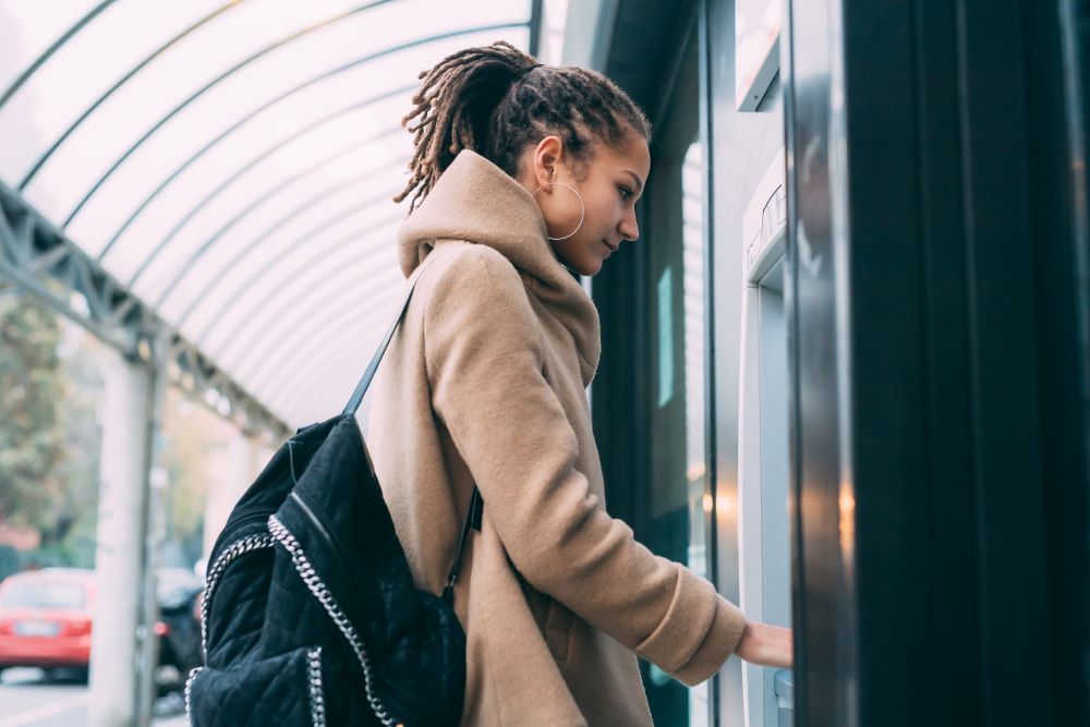 girl at atm