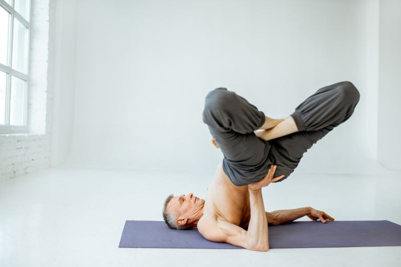 Baddha Konasana Sarvangasana (Bound Angle Shoulder Stand)