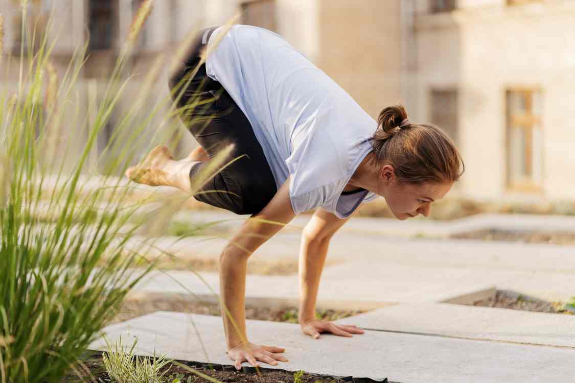 Performing Crow Pose