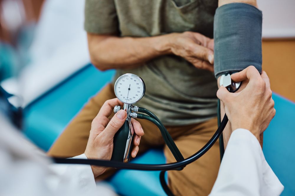 doctor monitoring blood pressure