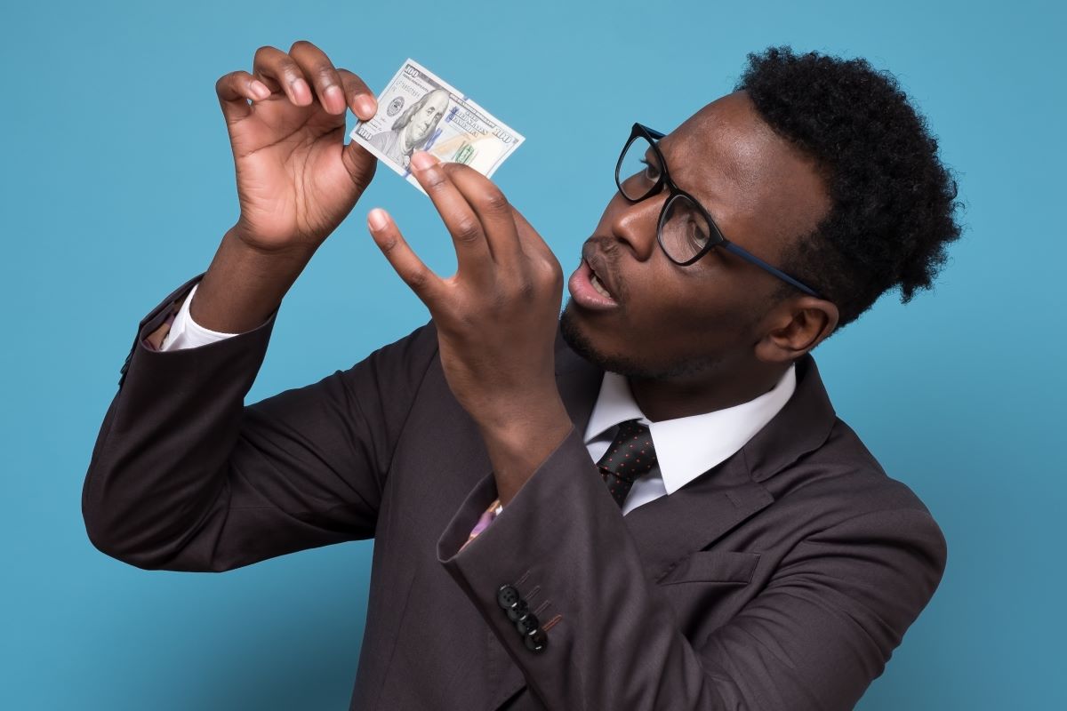 a man checking a bill