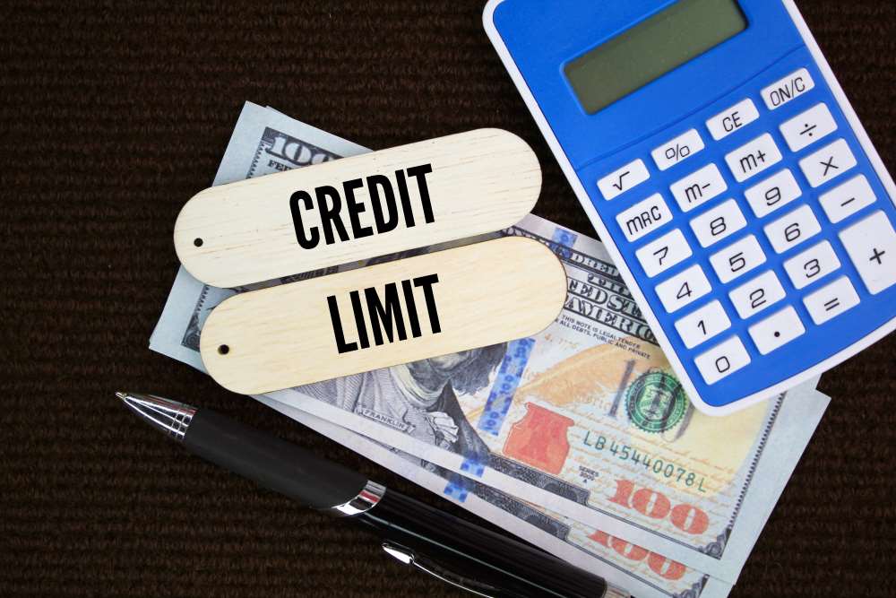 calculating credit limit with the help of pen and calculator