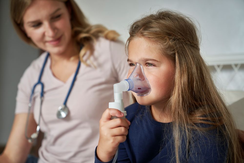 child-using-nebulizer-at-home