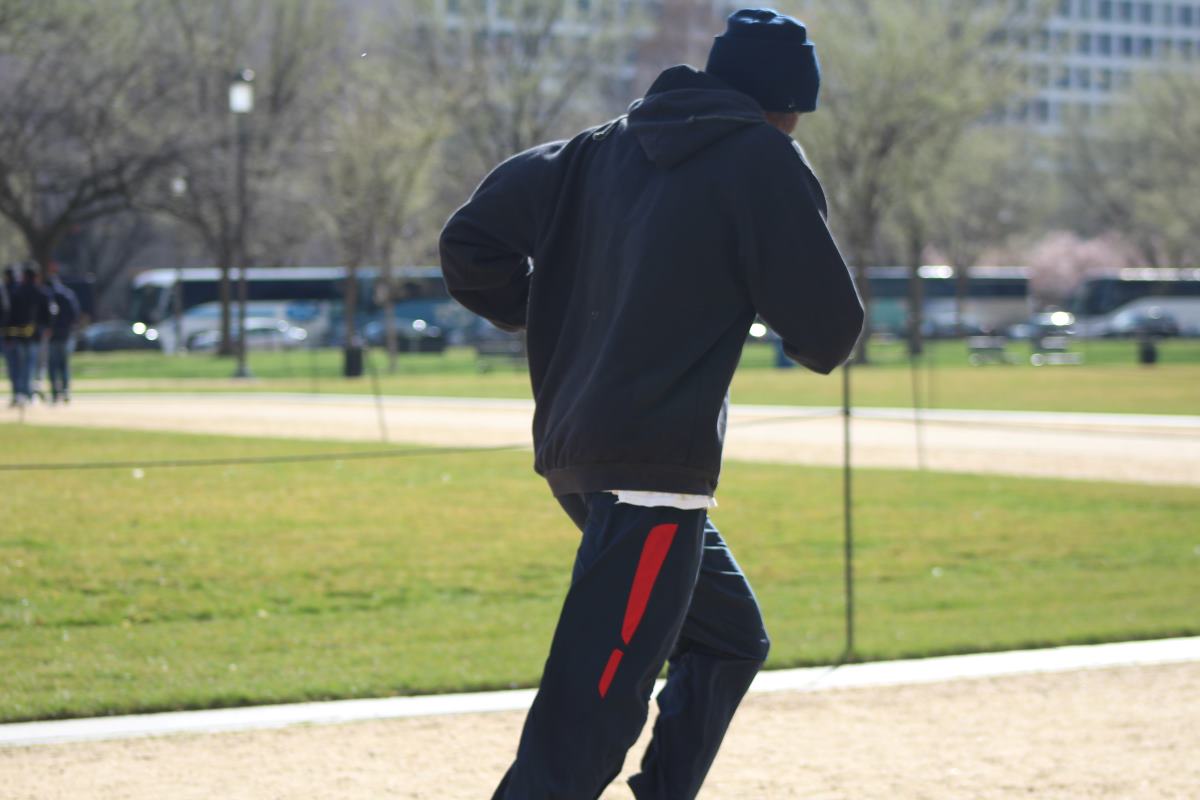 a man jogging on track