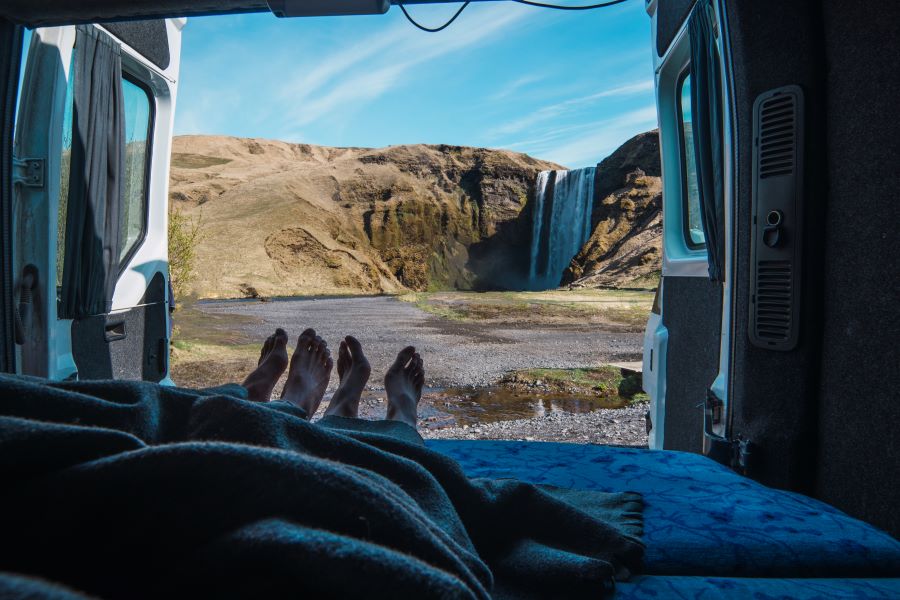 couples in truck watching waterfall