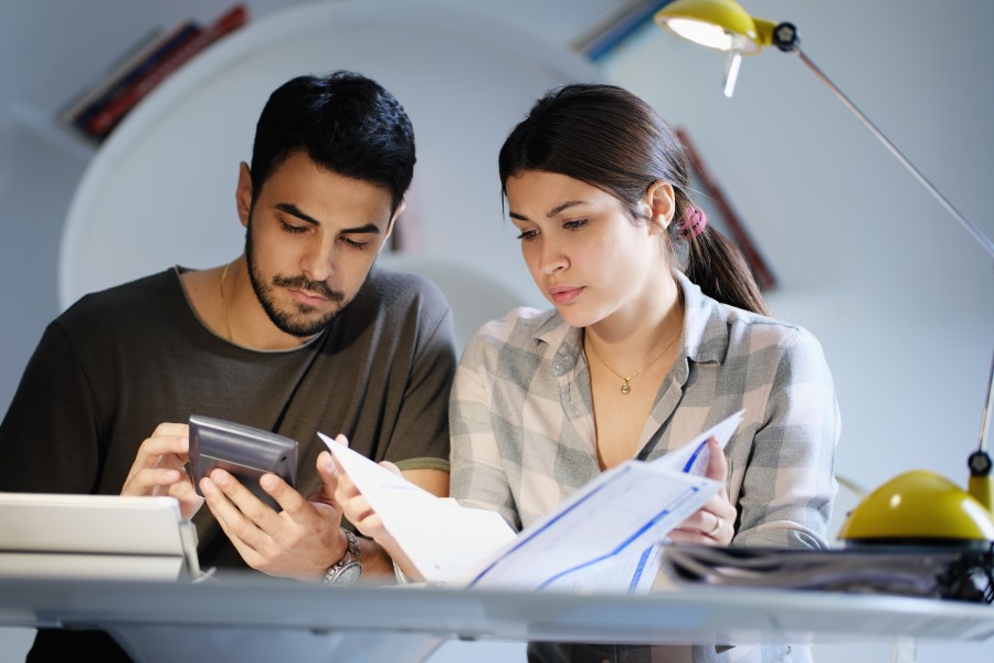 a parents calculating their children's educational loan using educational loan emi calculator