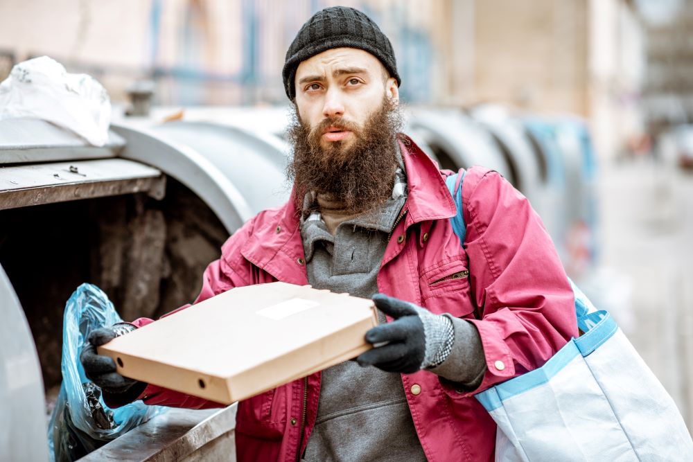 Beggar with pizza box