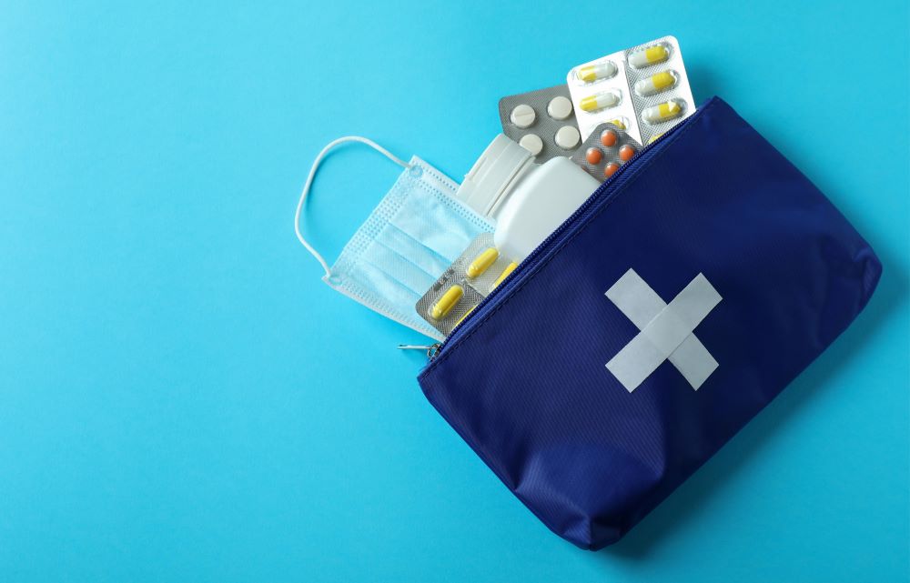 first aid kit in blue background