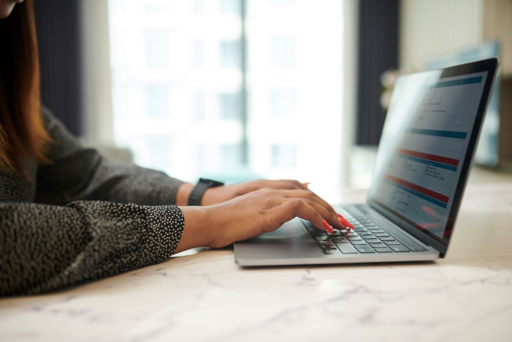 a girl working on laptop