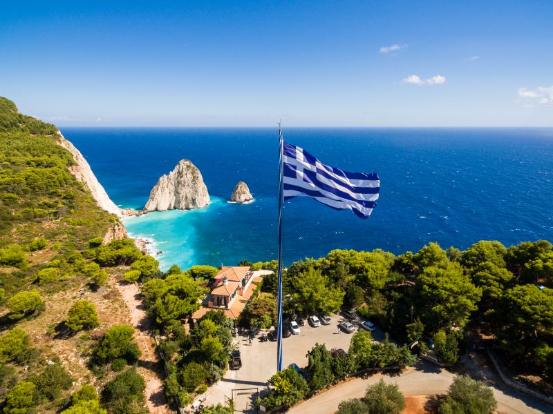 greece flag beside the ocean