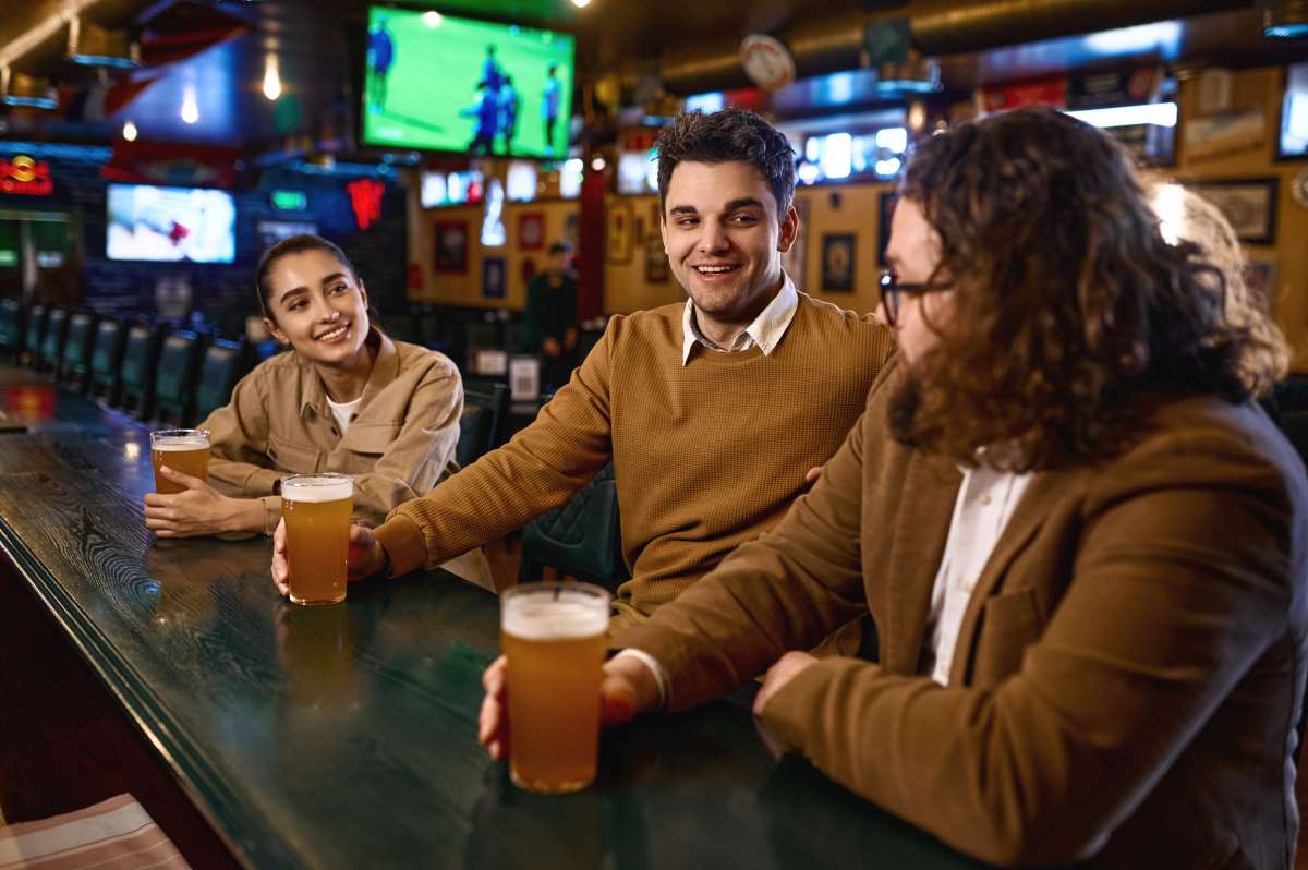 three people at pub