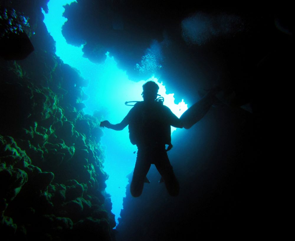 scuba diver in dark