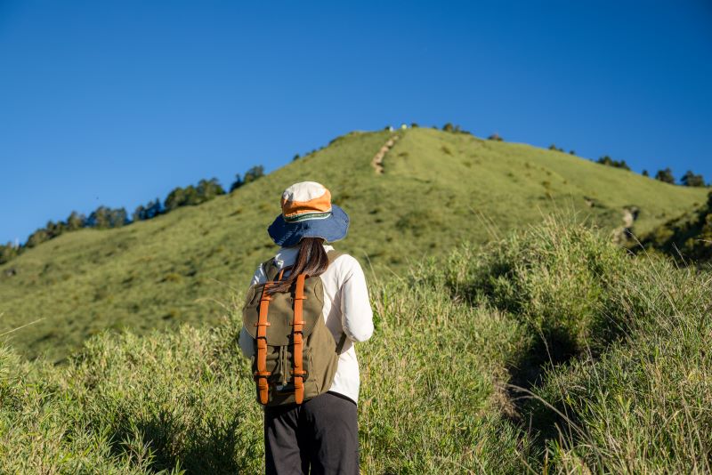 hike trail hiker woman walking over the mountain