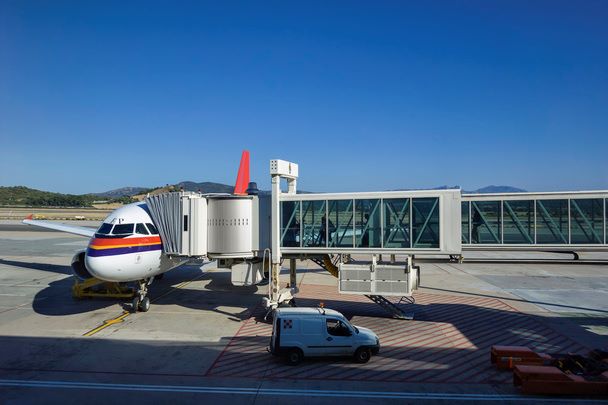 passenger boarding airplane