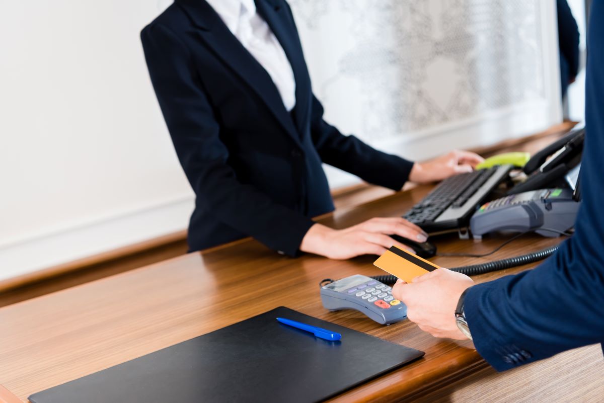 business man making a payment using lifetime credit card