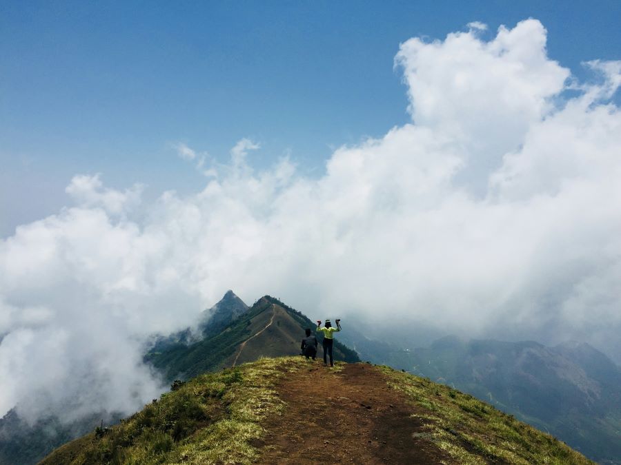 two people enjoying the view from meesapulimala