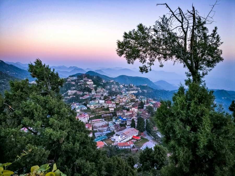 a beautiful view of mussoorie from gun hill road