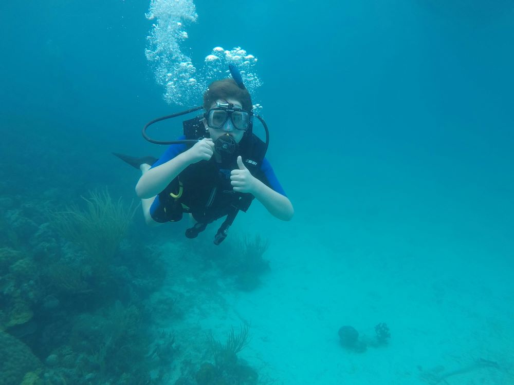 scuba diver showing okay to camera