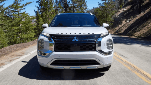 white outlander phev on road