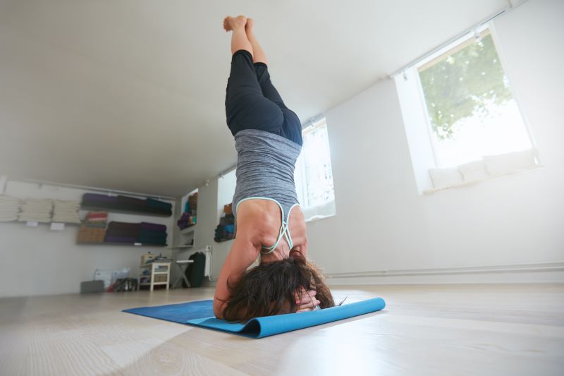 Perform a Sarvangasana