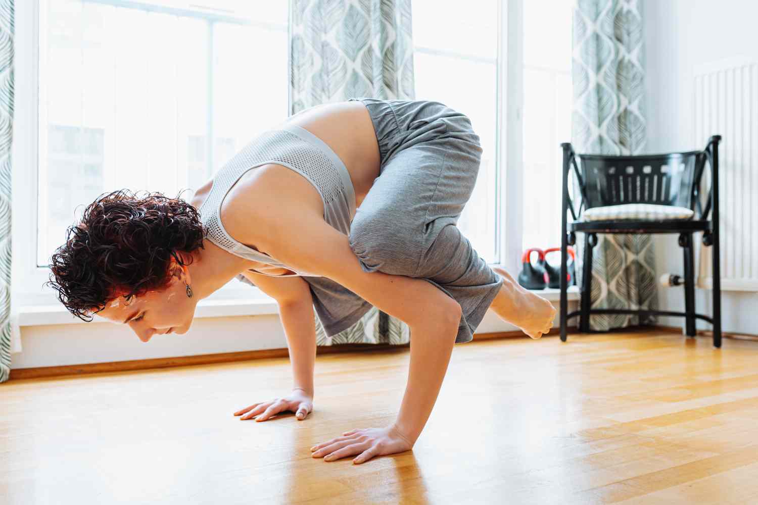 performing the bakasana