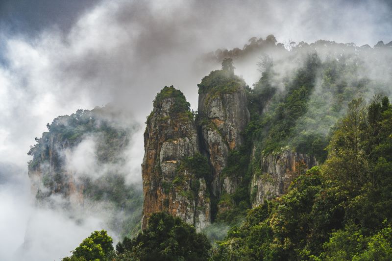 pillar rock covered in cloud