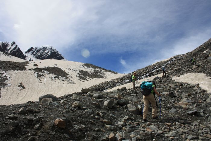 hikers climbing hills