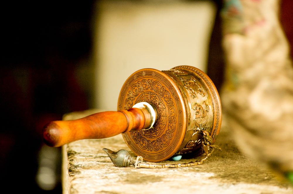 shot of prayer wheel in a buddhist temple