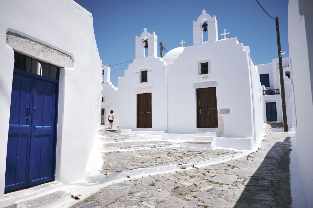 child walking through pyrgos village