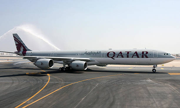 washing qatar airplane at airport