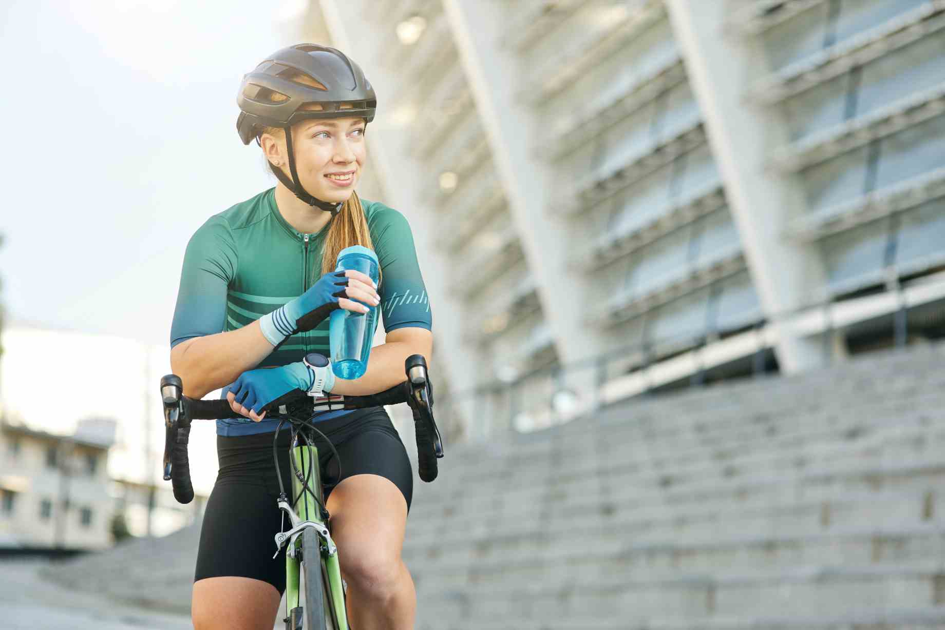 smiling young woman professional female cyclist