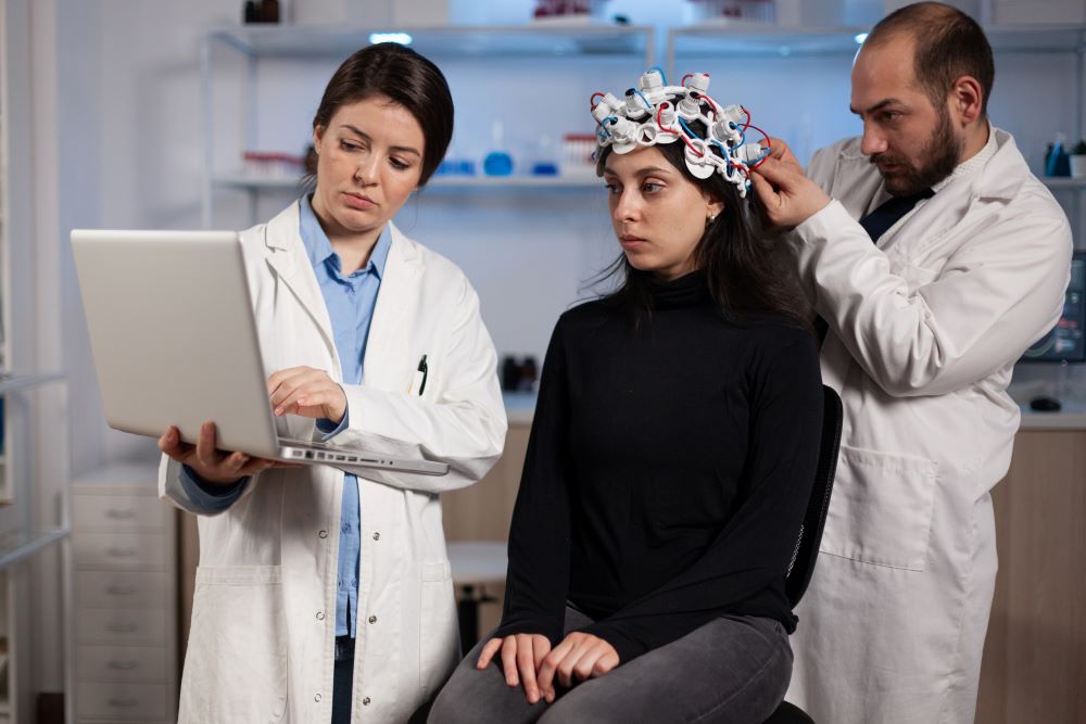 specialist-doctor-holding-laptop