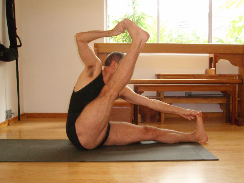  Straight Leg Akarna Dhanurasana