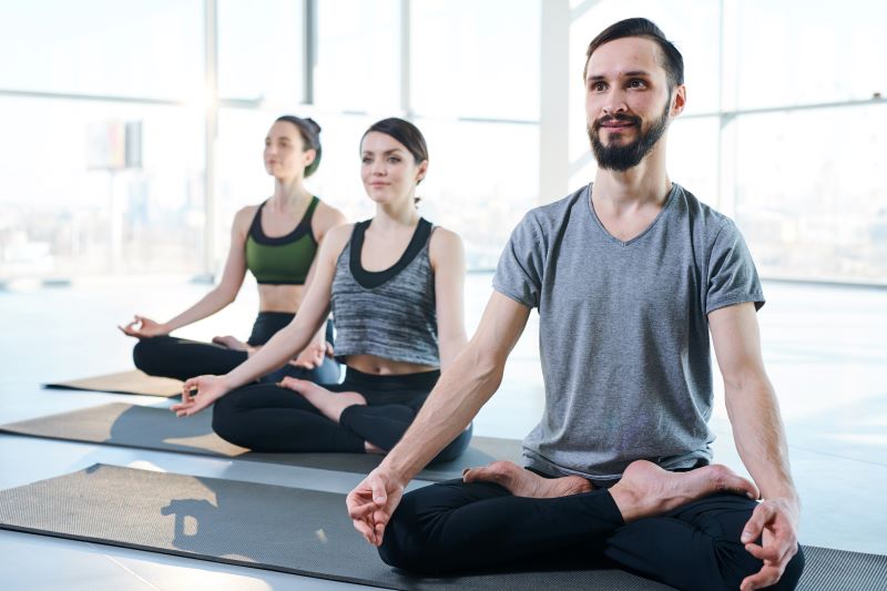 Performing Sukhasana