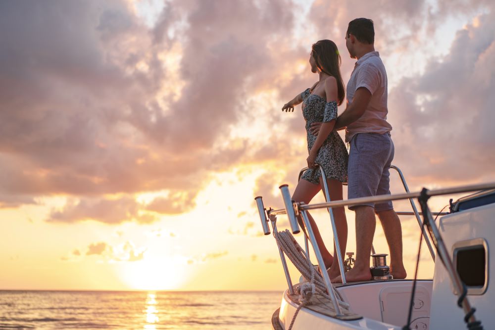 couples enjoying sunset in cruise