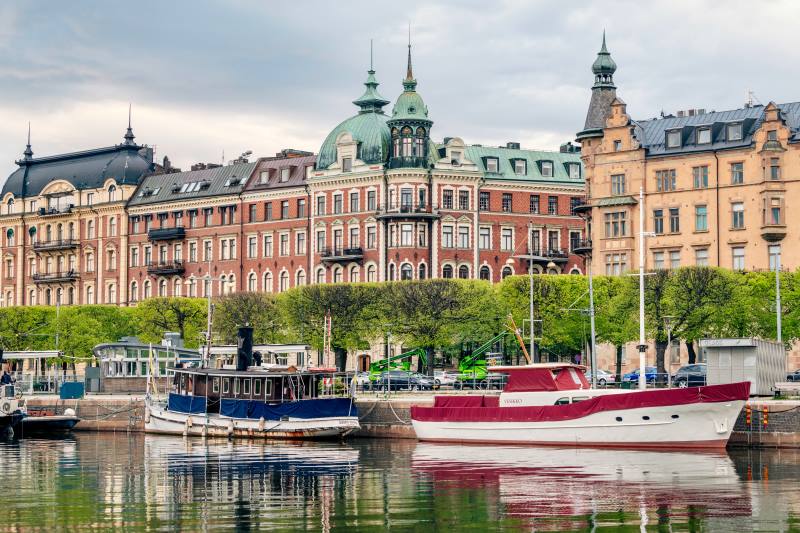 ancient sweden buildings beside the lake