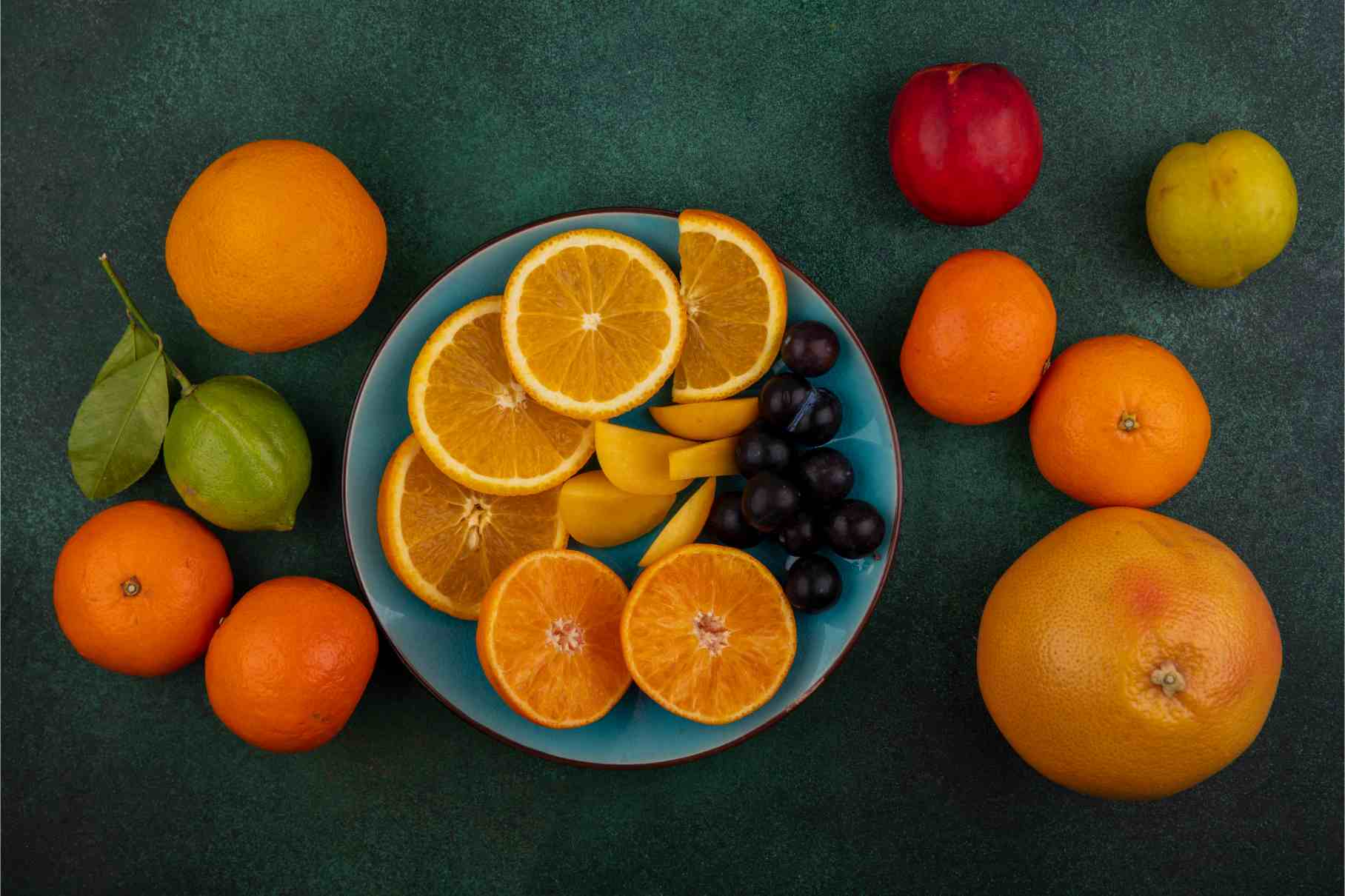 top-view-orange-slices-with-cherries