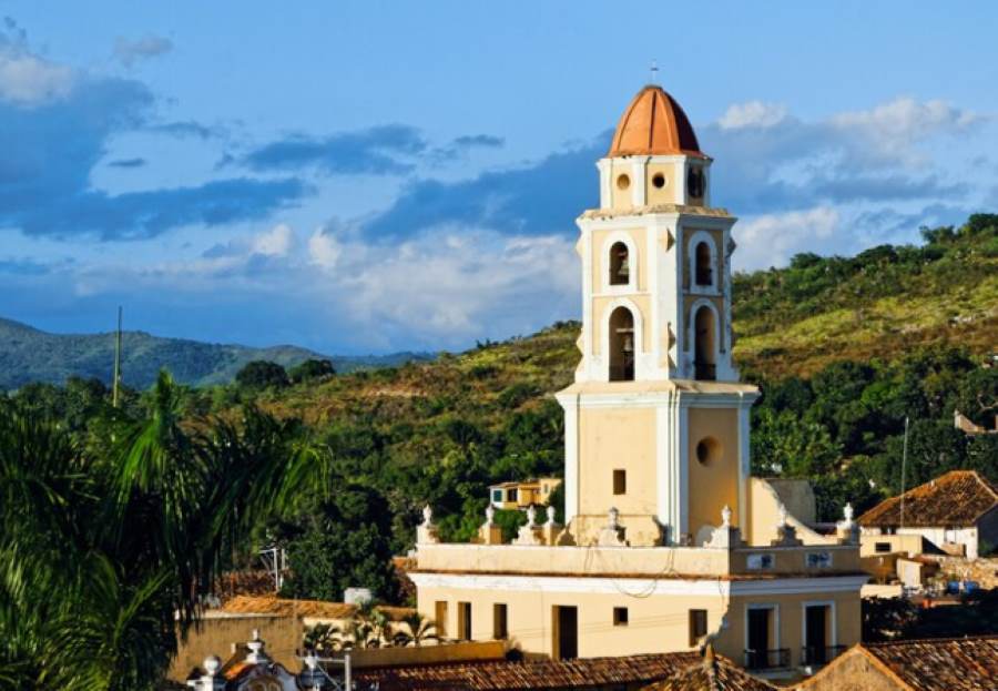 church and mountains