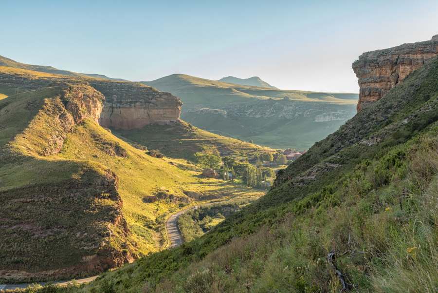 road passing between mountains