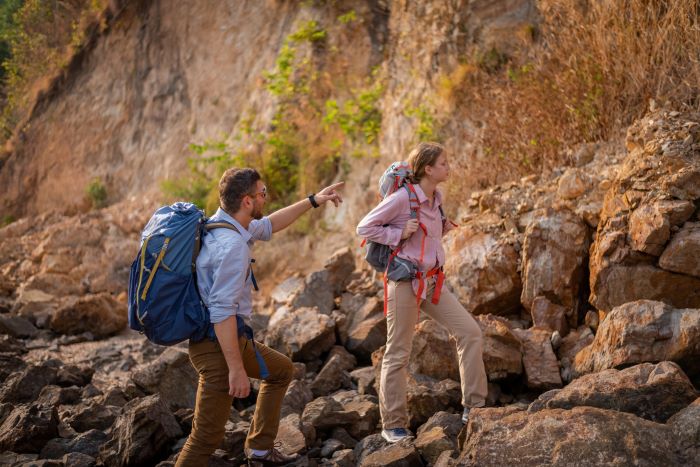 two hikers with bag