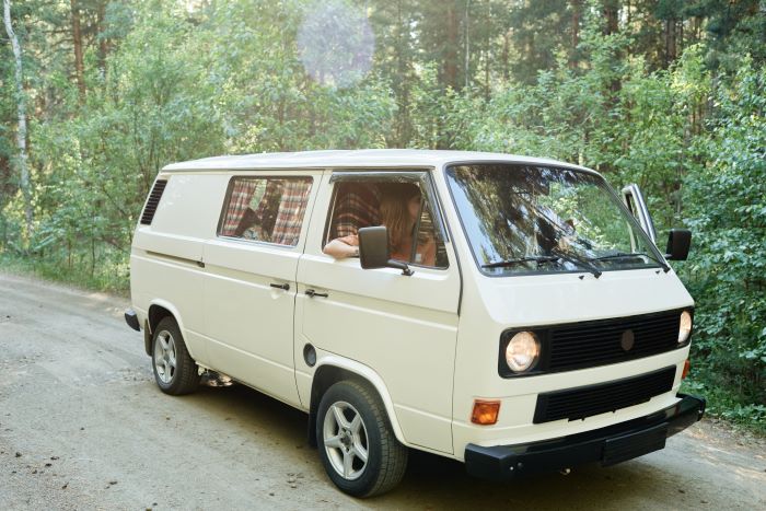 utility van with a woman driver