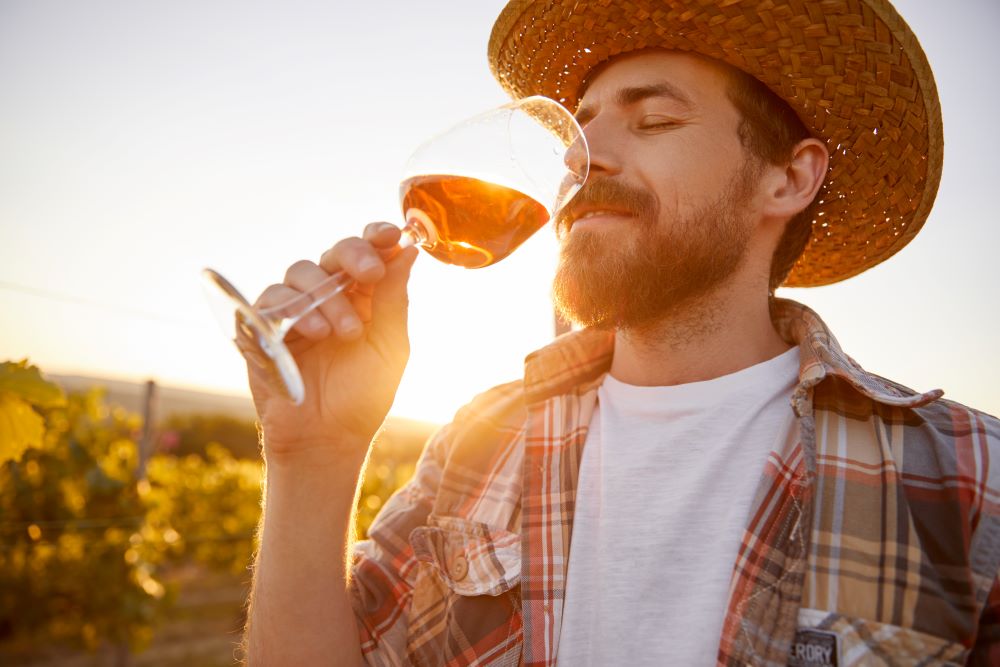 guy sipping wine