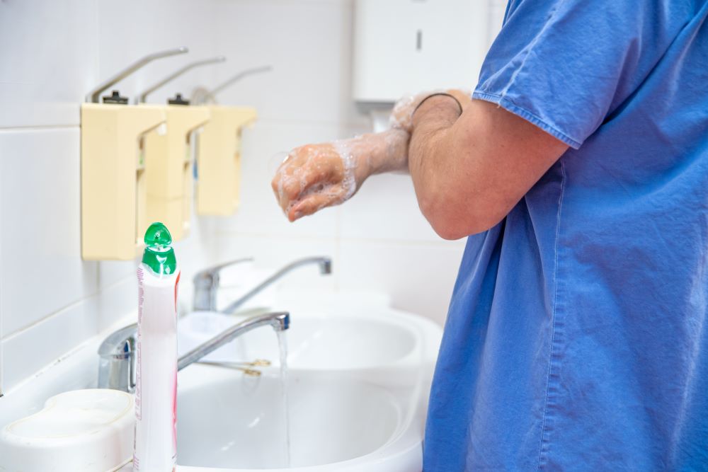 washing-hands-with-disinfectant