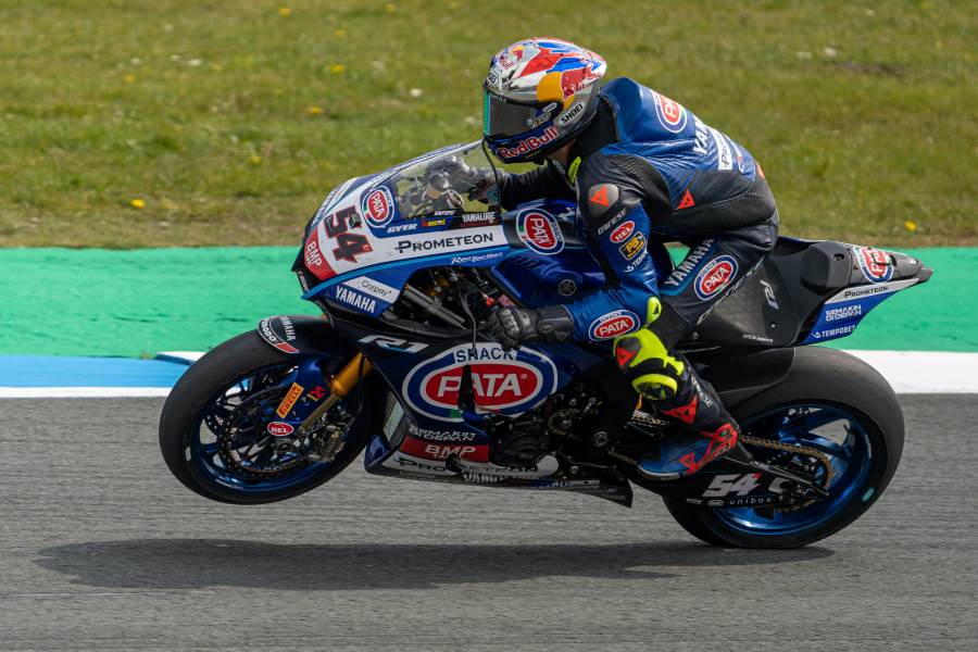 racer riding a yamaha superbike on the track and enjoying the amazing features