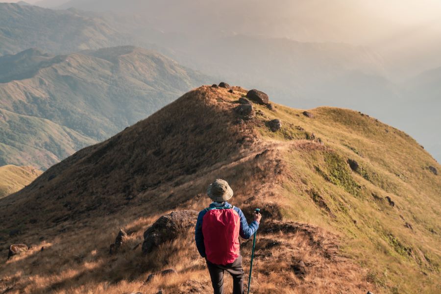 a man trekking alone