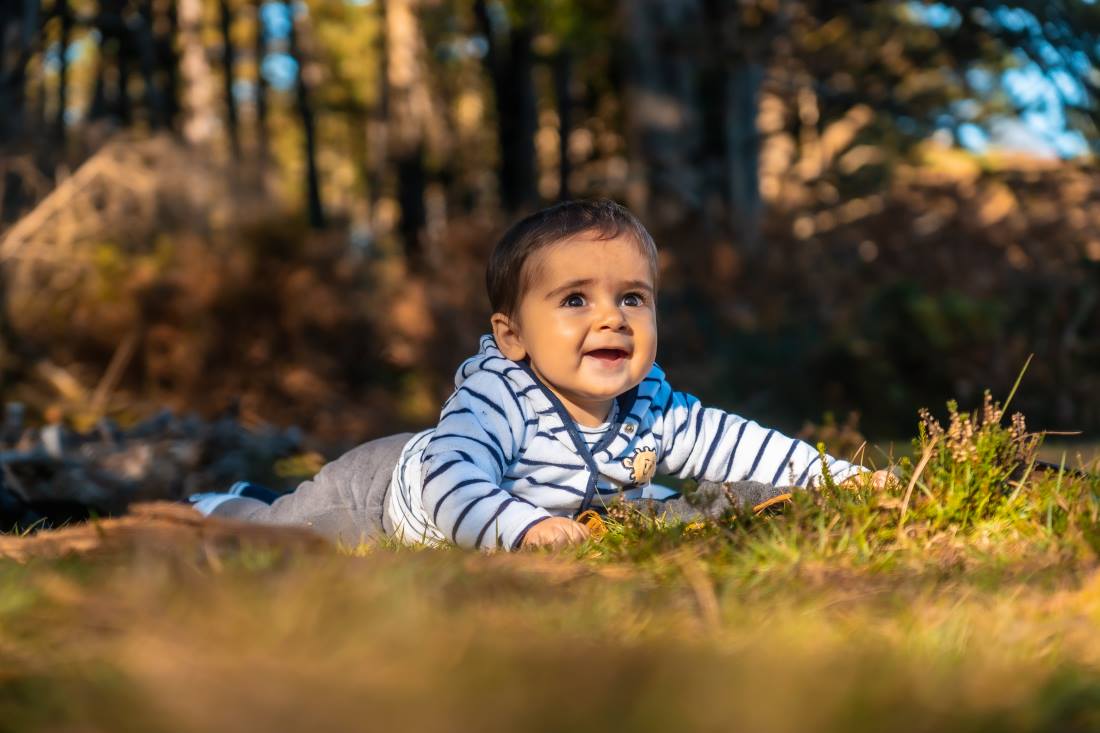 baby boy having fun at park