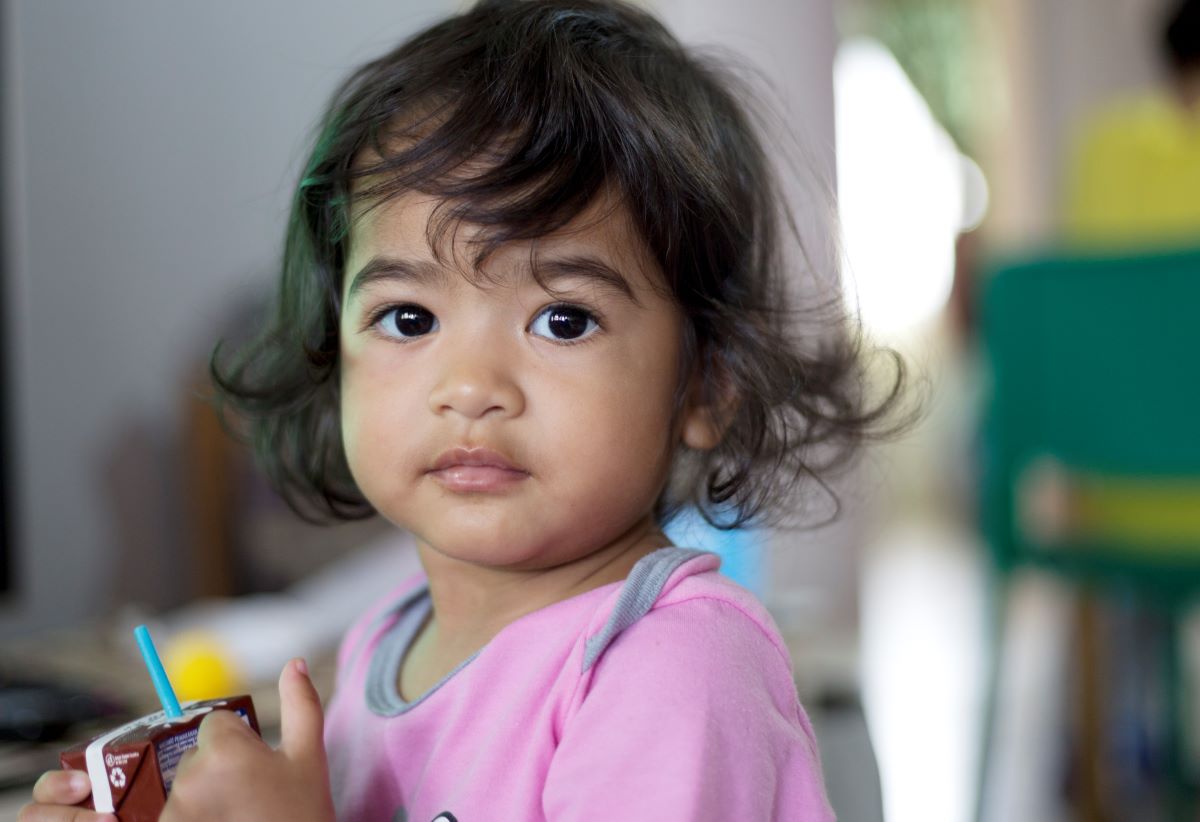 baby girl posing to camera