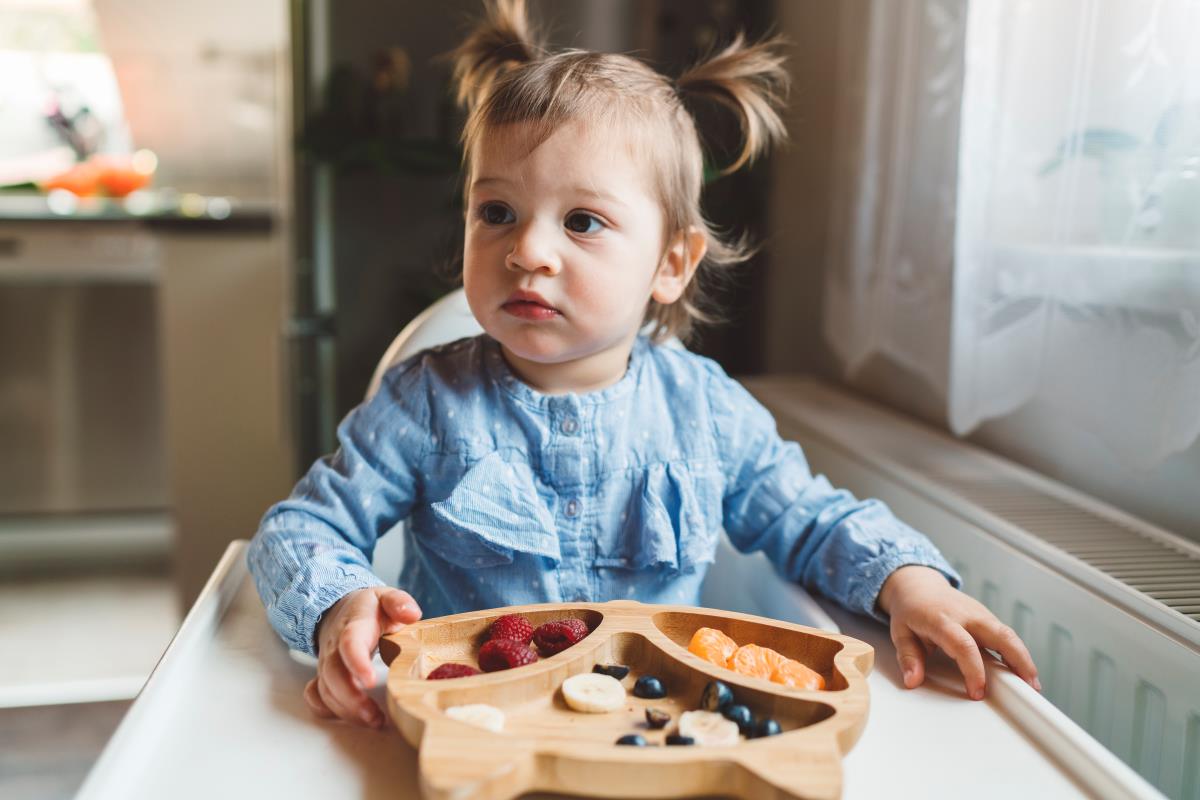 baby tasting solid food